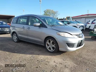 2010 Mazda 5 Sport with VIN JM1CR2W36A0388353, listed as a IAAI auction lot 42121004 with 169,658 mi miles. Bid and sale history available at carsss.com. Image 1.