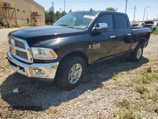 2016 Ram 2500 Laramie z VIN 3C6UR5FL8GG211403, wystawiony jako Copart lot #54799055 z przebiegiem Nie podano mil oraz Szkoda całkowita • Salvage title. Historia ofert i sprzedaży dostępna na DreamBid. Obrazek 1.