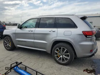 2018 Jeep Grand Cherokee Trackhawk with VIN 1C4RJFN91JC223825, listed as a Copart auction lot 58011465 with 83,177 mi miles and Salvage title. Bid and sale history available at DreamBid. Image 2.