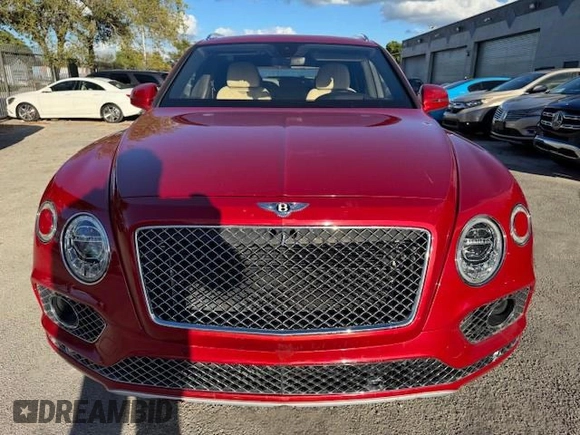 2017 Bentley Bentayga W12 z VIN SJAAC2ZV1HC014037, wystawiony jako Copart lot #54799655 z przebiegiem 36 099 mil mil oraz Szkody całkowita. Historia ofert i sprzedaży dostępna na DreamBid. Obrazek 5.
