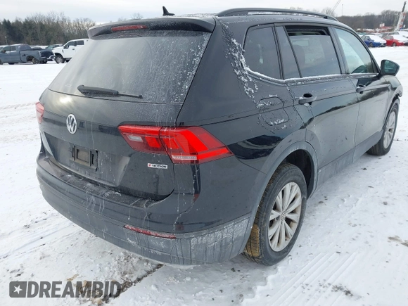 2020 Volkswagen Tiguan S with VIN 3VV0B7AXXLM080652, listed as a IAAI auction lot 41379678 with 46,330 mi miles and . Bid and sale history available at DreamBid. Image 4.