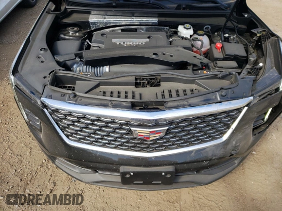 2024 Cadillac XT4 AWD Luxury with VIN 1GYFZBR4XRF199970, listed as a Copart auction lot 71496774 with 4,512 mi miles and Salvage Title. Bid and sale history available at carsss.com. Image 11.