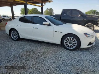 2014 Maserati Ghibli z VIN ZAM57XSA5E1081980, wystawiony jako Copart lot #53546905 z przebiegiem 60 019 mil mil oraz Tytuł czysty. Historia ofert i sprzedaży dostępna na DreamBid. Obrazek 4.