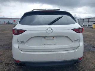 2019 Mazda CX-5 Grand Touring with VIN JM3KFBDM9K0697467, listed as a IAAI auction lot 41940364 with 62,015 mi miles. Bid and sale history available at carsss.com. Image 17.