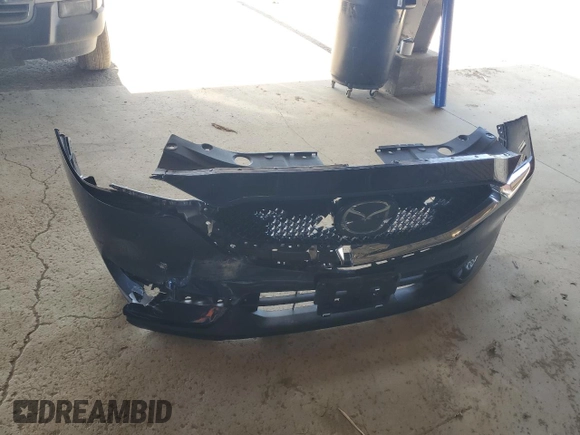2019 Mazda CX-5 Grand Touring with VIN JM3KFADM3K1539890, listed as a Copart auction lot 57809835 with 56,079 mi miles and Salvage title. Bid and sale history available at DreamBid. Image 13.