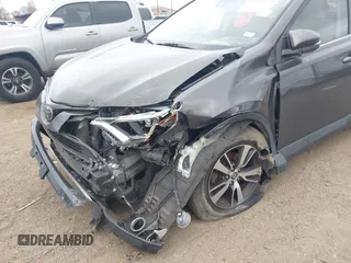 2018 Toyota RAV4 XLE with VIN JTMRFREV0JJ749388, listed as a IAAI auction lot 41613930 with 62,225 mi miles. Bid and sale history available at carsss.com. Image 6.