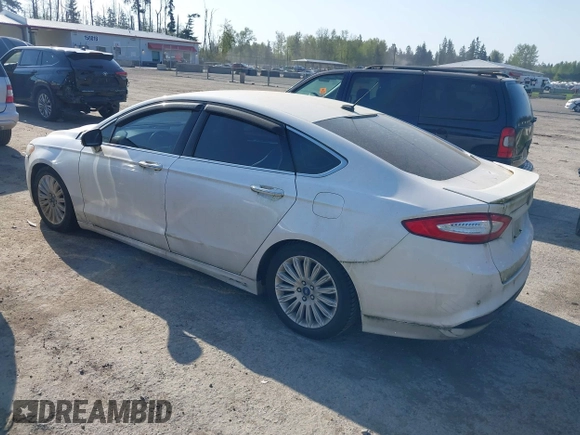 2016 Ford Fusion Titanium Hybrid with VIN 3FA6P0RU2GR357739, listed as a IAAI auction lot 42120441 with 151,201 mi miles. Bid and sale history available at carsss.com. Image 3.