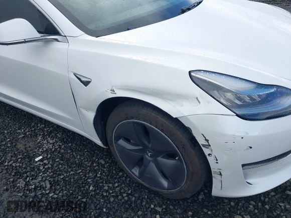 2018 Tesla Model 3 Long Range Battery with VIN 5YJ3E1EA3JF013253, listed as a IAAI auction lot 41752102 with 84,459 mi miles. Bid and sale history available at carsss.com. Image 6.