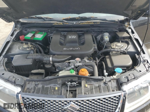 2007 Suzuki Grand Vitara with VIN JS3TE941474202110, listed as a Copart auction lot 52110865 with 132,661 mi miles and Salvage title. Bid and sale history available at DreamBid. Image 12.