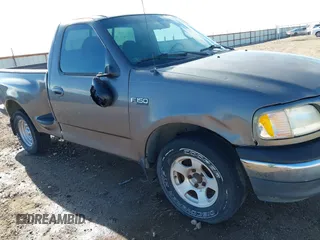 2002 Ford F-150 XL z VIN 1FTRF07272KB83272, wystawiony jako IAAI lot #41266432 z przebiegiem Nie podano mil oraz . Historia ofert i sprzedaży dostępna na DreamBid. Obrazek 6.