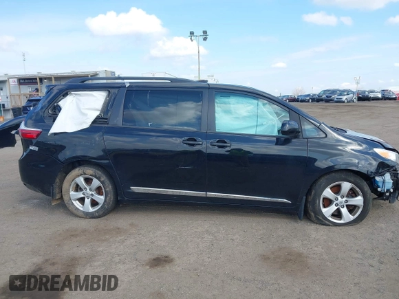 2016 Toyota Sienna LE AAS with VIN 5TDKK3DC8GS739715, listed as a IAAI auction lot 42015201 with 68,417 mi miles. Bid and sale history available at carsss.com. Image 13.
