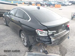 2019 BMW 4 Series 430i with VIN WBA4J1C53KBM17029, listed as a IAAI auction lot 41933607 with 54,107 mi miles and . Bid and sale history available at DreamBid. Image 3.