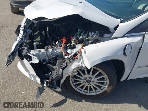 2013 Ford Focus Electric z VIN 1FADP3R42DL196988, wystawiony jako IAAI lot #41425512 z przebiegiem 72 578 mil mil oraz . Historia ofert i sprzedaży dostępna na DreamBid. Obrazek 16.