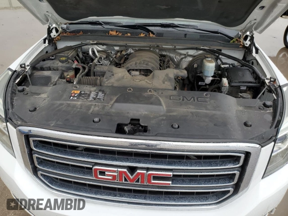 2016 GMC Yukon XL SLT z VIN 1GKS1GKC7GR271380, wystawiony jako Copart lot #54125245 z przebiegiem 115 731 mil mil oraz Szkoda całkowita • Salvage title. Historia ofert i sprzedaży dostępna na DreamBid. Obrazek 12.
