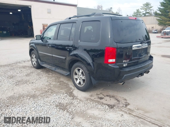 2009 Honda Pilot Touring with VIN 5FNYF48969B055806, listed as a IAAI auction lot 42138651 with 253,623 mi miles and . Bid and sale history available at carsss.com. Image 3.