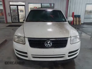 2004 Volkswagen Touareg with VIN WVGBC67L04D026451, listed as a IAAI auction lot 41859371 with 151,392 mi miles and . Bid and sale history available at DreamBid. Image 6.