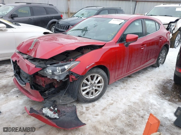 2016 Mazda Mazda3 i Grand Touring with VIN 3MZBM1N77GM245567, listed as a IAAI auction lot 41330883 with 128,423 mi miles. Bid and sale history available at carsss.com. Image 17.
