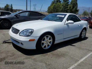 2001 Mercedes-Benz SLK 230 Kompressor with VIN WDBKK49F61F193012, listed as a Copart auction lot 63621655 with 176,523 mi miles and Salvage title. Bid and sale history available at DreamBid. Image 1.