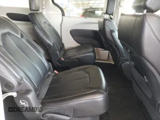 2023 Chrysler Pacifica Touring L with VIN 2C4RC1BG1PR581376, listed as a Copart auction lot 59901915 with 57,411 mi miles and Salvage title. Bid and sale history available at DreamBid. Image 11.