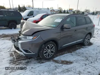 2016 Mitsubishi Outlander SE with VIN JA4AZ3A33GZ051271, listed as a IAAI auction lot 41161321 with 61,306 mi miles and . Bid and sale history available at DreamBid. Image 2.