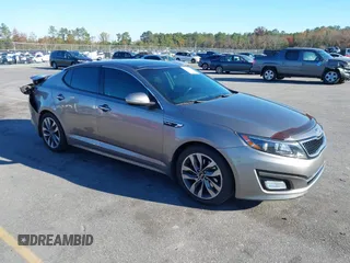 2015 Kia Optima SX Turbo with VIN 5XXGR4A66FG382167, listed as a IAAI auction lot 40951399 with 77,083 mi miles and . Bid and sale history available at DreamBid. Image 1.
