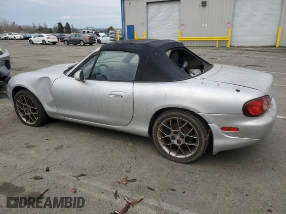 2004 Mazda MX-5 Miata LS with VIN JM1NB353440402453, listed as a Copart auction lot 45064475 with 151,508 mi miles and Salvage title. Bid and sale history available at DreamBid. Image 2.