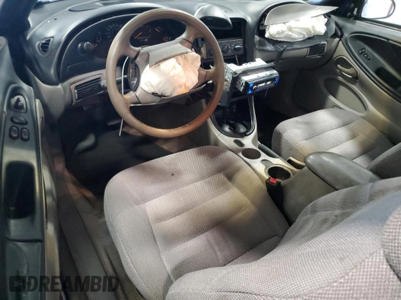 1996 Ford Mustang z VIN 1FALP4047TF185562, wystawiony jako Copart lot #55995745 z przebiegiem 154 906 mil mil oraz Szkoda całkowita • Salvage title. Historia ofert i sprzedaży dostępna na DreamBid. Obrazek 8.