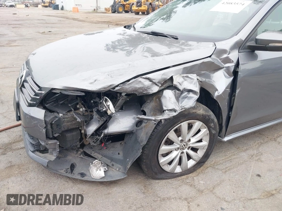 2012 Volkswagen Passat S with VIN 1VWAH7A31CC087907, listed as a IAAI auction lot 42083574 with 185,591 mi miles and . Bid and sale history available at DreamBid. Image 6.
