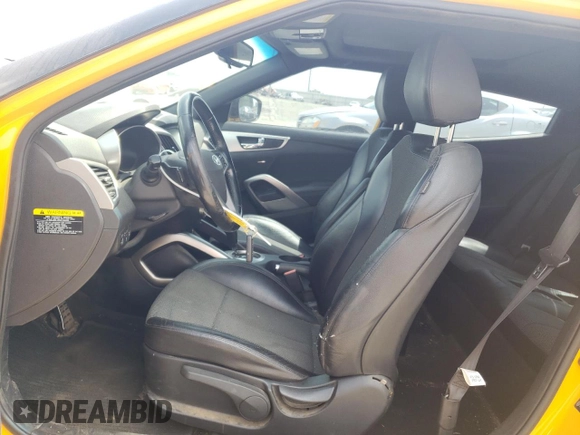 2016 Hyundai Veloster z VIN KMHTC6AD8GU278670, wystawiony jako Copart lot #57315695 z przebiegiem 89 496 mil mil oraz Szkoda całkowita • Salvage title. Historia ofert i sprzedaży dostępna na DreamBid. Obrazek 7.