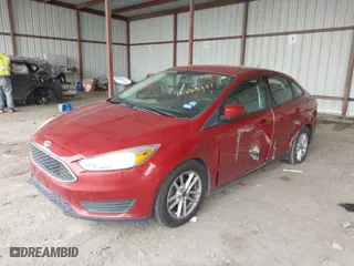 2018 Ford Focus SE with VIN 1FADP3F25JL299174, listed as a IAAI auction lot 41625881 with 87,068 mi miles. Bid and sale history available at carsss.com. Image 2.