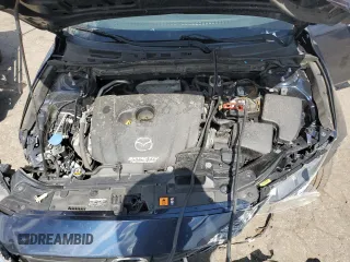 2018 Mazda 3 Touring z VIN 3MZBN1V31JM168860, wystawiony jako Copart lot #61908745 z przebiegiem Nie podano mil oraz Szkoda całkowita • Salvage title. Historia ofert i sprzedaży dostępna na DreamBid. Obrazek 11.