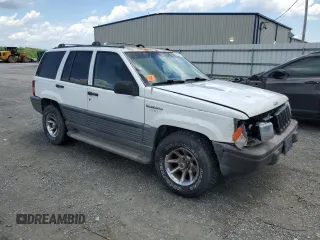 1995 Jeep Grand Cherokee Laredo с VIN 1J4GZ58S5SC724222, выставлен на аукционе Copart как лот 57837155 с пробегом 246 303 миль миль и Списание • Salvage title. История ставок и продаж доступна на DreamBid. Изображение 4.