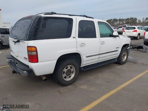 2002 GMC Yukon SLT with VIN 1GKEC13Z22J274962, listed as a IAAI auction lot 41387262 with 283,660 mi miles. Bid and sale history available at carsss.com. Image 4.