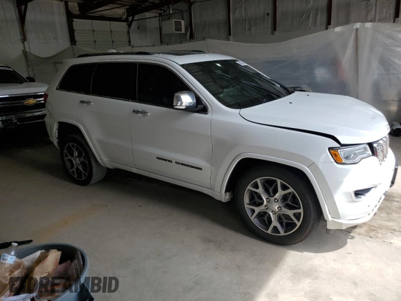 2020 Jeep Grand Cherokee High Altitude with VIN 1C4RJFCG3LC137954, listed as a Copart auction lot 54392495 with 109,493 mi miles and Salvage title. Bid and sale history available at DreamBid. Image 4.