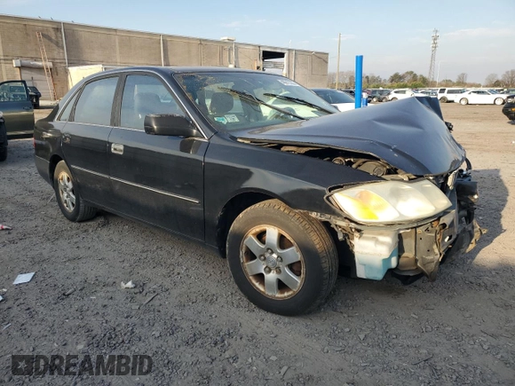 2001 Toyota Avalon XL z VIN 4T1BF28B61U175674, wystawiony jako Copart lot #49913765 z przebiegiem 170 245 mil mil oraz Tytuł czysty. Historia ofert i sprzedaży dostępna na DreamBid. Obrazek 4.