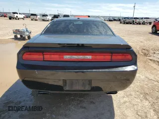 2013 Dodge Challenger SXT z VIN 2C3CDYAG0DH652215, wystawiony jako Copart lot #54781875 z przebiegiem 251 547 mil mil oraz Szkoda całkowita • Salvage title. Historia ofert i sprzedaży dostępna na DreamBid. Obrazek 6.