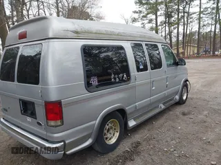 2002 Ford Econoline Cargo with VIN 1FDRE14W72HB82339, listed as a IAAI auction lot 41730429 with 214,165 mi miles and . Bid and sale history available at DreamBid. Image 4.