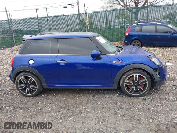 2019 MINI Hardtop John Cooper Works with VIN WMWXM9C5XK2H38801, listed as a IAAI auction lot 42029312 with 96,205 mi miles and . Bid and sale history available at DreamBid. Image 14.