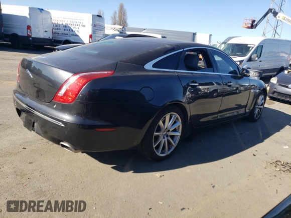 2012 Jaguar XJ with VIN SAJWA1CB7CLV33879, listed as a Copart auction lot 88708995 with Not provided miles and Salvage title. Bid and sale history available at DreamBid. Image 3.
