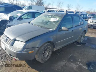 2004 Volkswagen Jetta Sedan GLS with VIN 3VWSA69M64M092875, listed as a IAAI auction lot 41450639 with 143,520 mi miles. Bid and sale history available at carsss.com. Image 14.