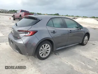 2025 Toyota Corolla Hatchback SE with VIN JTND4MBEXS3233984, listed as a Copart auction lot 73129614 with 4,581 mi miles and Salvage Title. Bid and sale history available at carsss.com. Image 3.