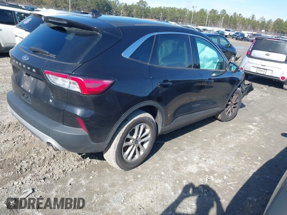 2021 Ford Escape SE with VIN 1FMCU0G62MUB07332, listed as a IAAI auction lot 41452692 with 56,663 mi miles and . Bid and sale history available at carsss.com. Image 4.