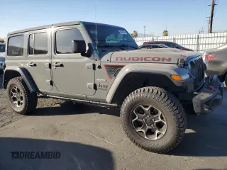 2020 Jeep Wrangler Unlimited Recon with VIN 1C4HJXFN5LW304700, listed as a Copart auction lot 86005334 with 32,786 mi miles and Salvage title. Bid and sale history available at DreamBid. Image 4.