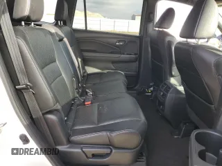 2020 Honda Passport Touring z VIN 5FNYF8H9XLB016652, wystawiony jako Copart lot #80346824 z przebiegiem 81 680 mil mil oraz Szkoda całkowita • Salvage title. Historia ofert i sprzedaży dostępna na DreamBid. Obrazek 11.