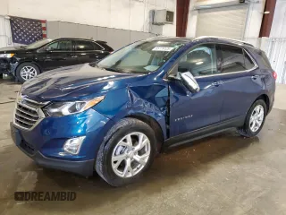 2020 Chevrolet Equinox Premier z VIN 2GNAXXEV4L6276570, wystawiony jako Copart lot #55779125 z przebiegiem 53 927 mil mil oraz Szkoda całkowita • Salvage title. Historia ofert i sprzedaży dostępna na DreamBid. Obrazek 1.