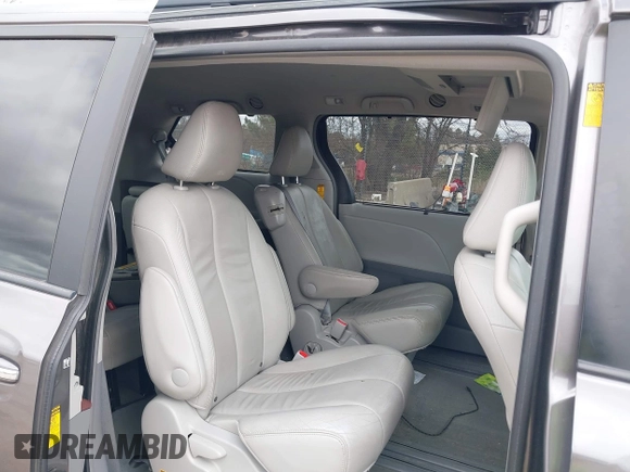 2014 Toyota Sienna XLE with VIN 5TDYK3DC0ES422700, listed as a IAAI auction lot 42049181 with 147,498 mi miles. Bid and sale history available at carsss.com. Image 8.