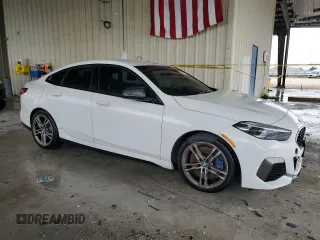 2020 BMW 2 Series M235i xDrive with VIN WBA13AL07L7F63068, listed as a Copart auction lot 73824364 with 62,138 mi miles and Salvage Title. Bid and sale history available at carsss.com. Image 4.