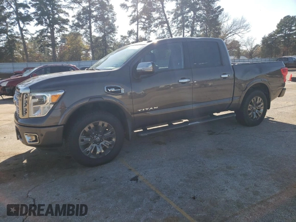 2017 Nissan Titan SL z VIN 1N6AA1E54HN512447, wystawiony jako Copart lot #85330734 z przebiegiem 119 424 mil mil oraz Czysty tytuł • Clean title. Historia ofert i sprzedaży dostępna na DreamBid. Obrazek 1.