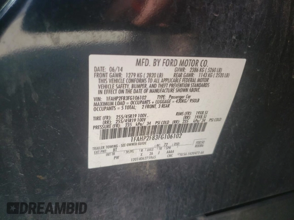 2015 Ford Taurus Limited with VIN 1FAHP2F83FG106102, listed as a Copart auction lot 49819005 with 100,925 mi miles and Salvage Title. Bid and sale history available at DreamBid. Image 12.