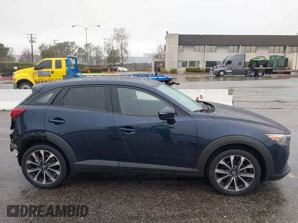 2019 Mazda CX-3 Touring with VIN JM1DKDC79K0424436, listed as a IAAI auction lot 41579280 with 76,989 mi miles. Bid and sale history available at carsss.com. Image 14.